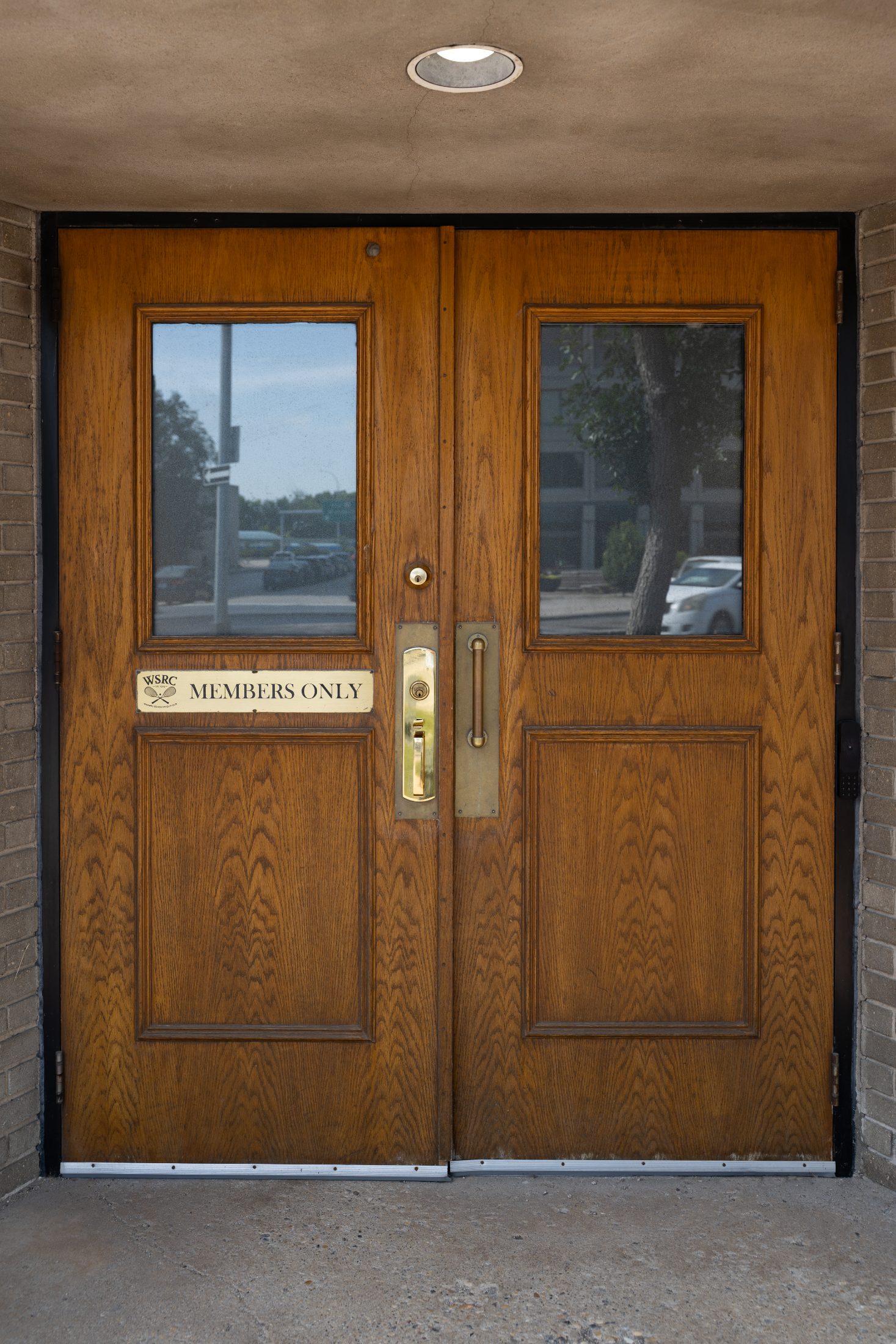 The oak members' doors on Stradbrook Avenue