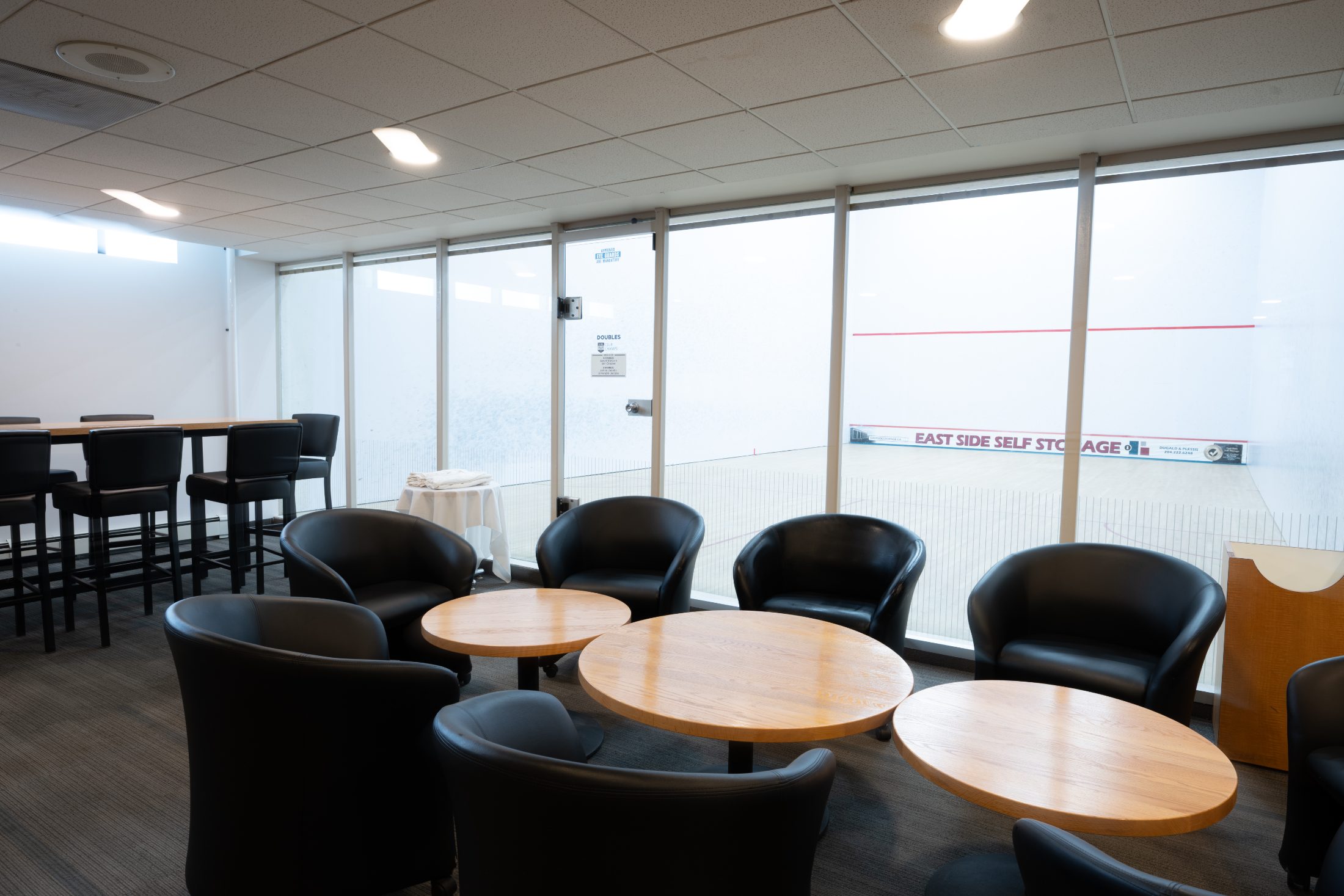 The lounge beside the doubles court