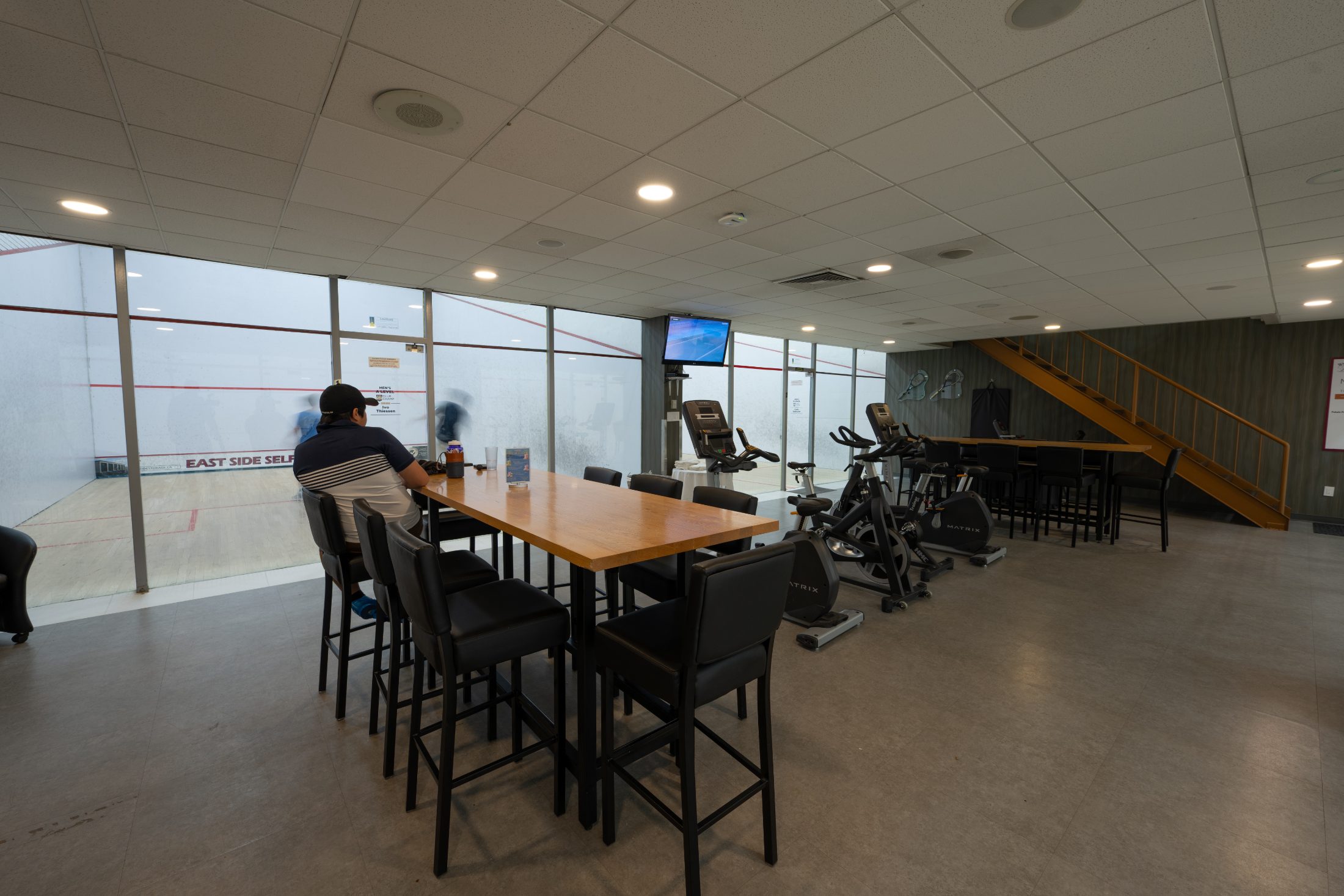 The lounge overlooking the courts