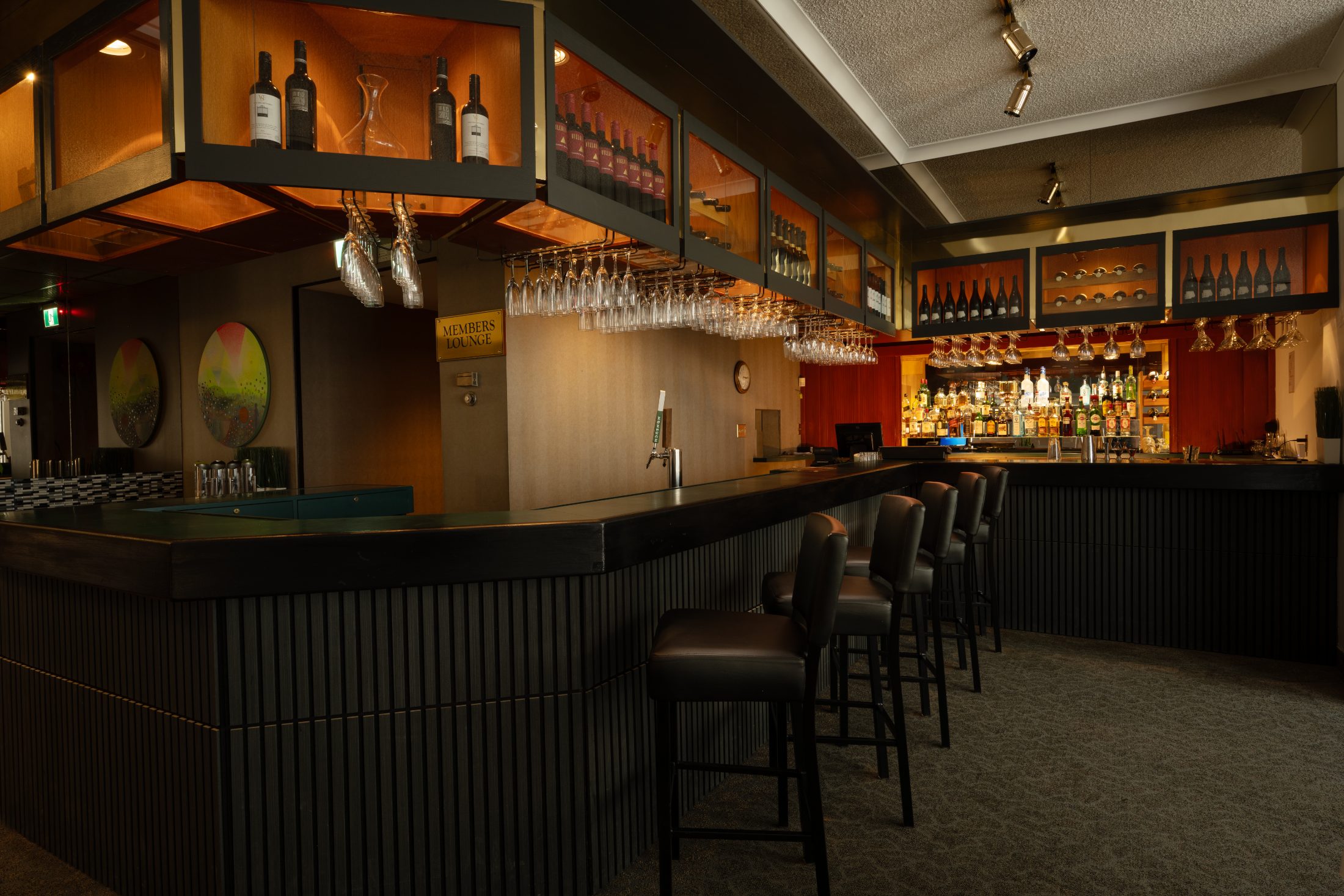 The members&rsquo; bar in the Hopwood Lounge at the Winnipeg Squash Racquet Club