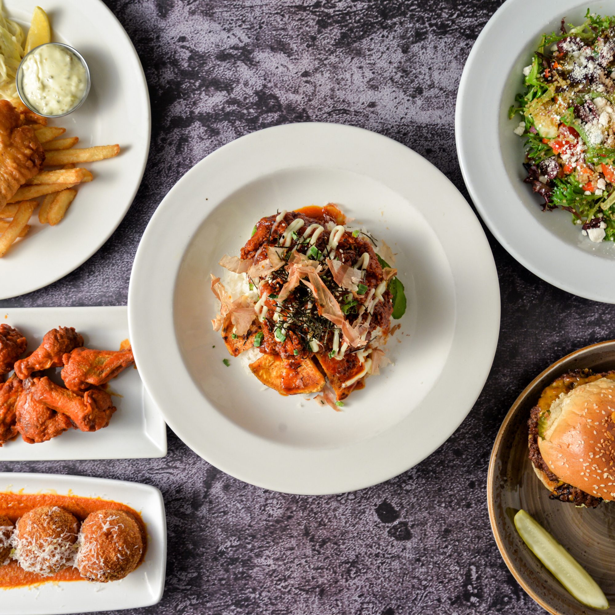 A spread from the Hopwood Lounge at the Winnipeg Squash Racquet Club, member dining in Winnipeg