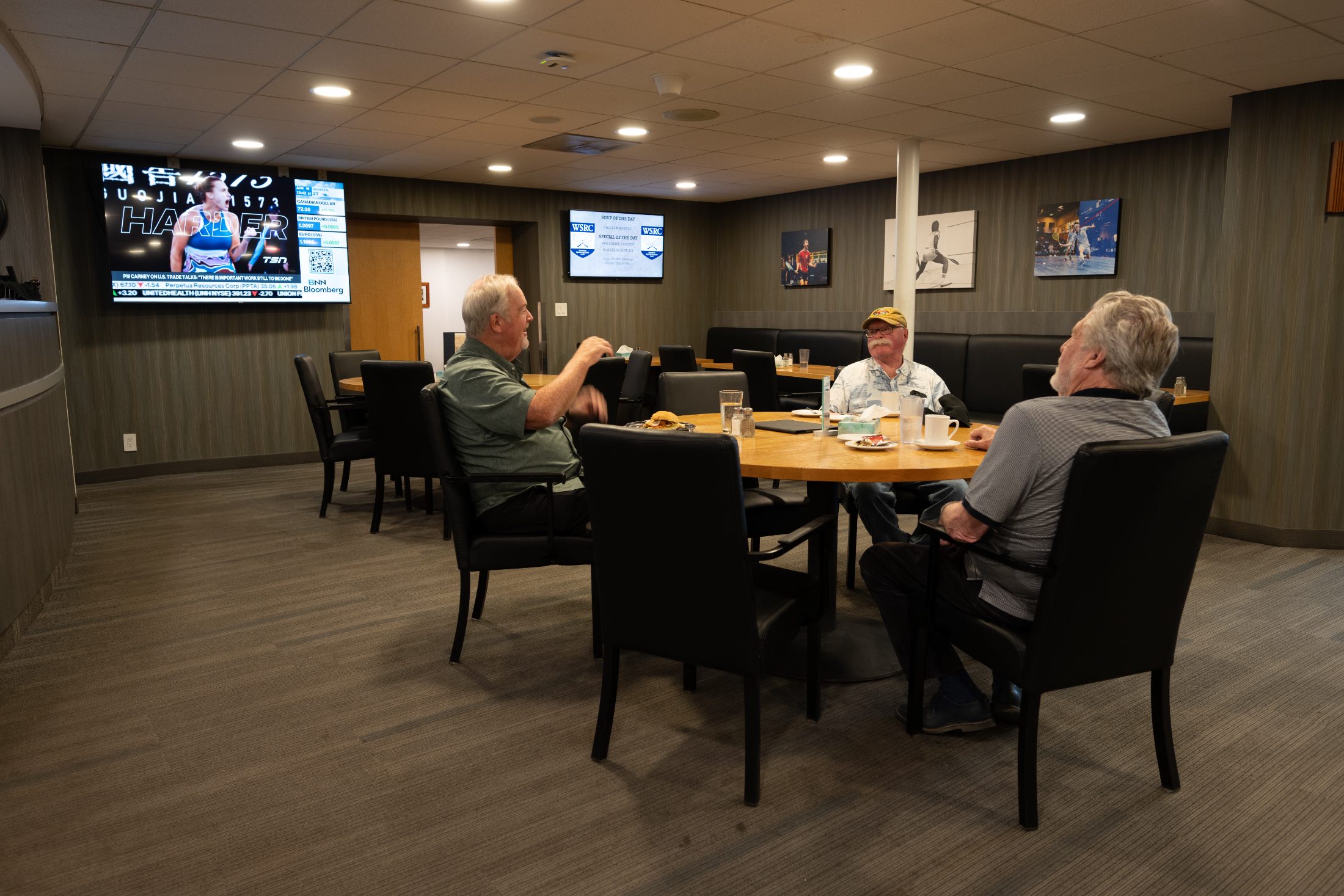 Members gathered around a table
