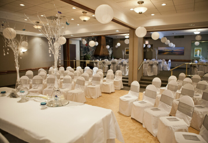 Head table at wedding hosted at Winnipeg Squash Racquet Club