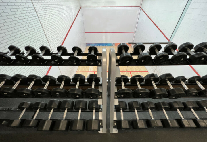 Weight Rack overlooking squash court at Winnipeg Squash Racquet Club