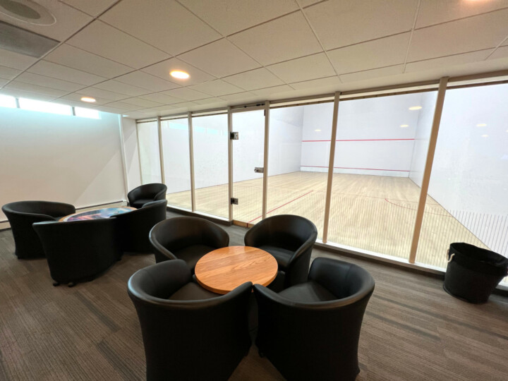 Lounge in full view of squash courts